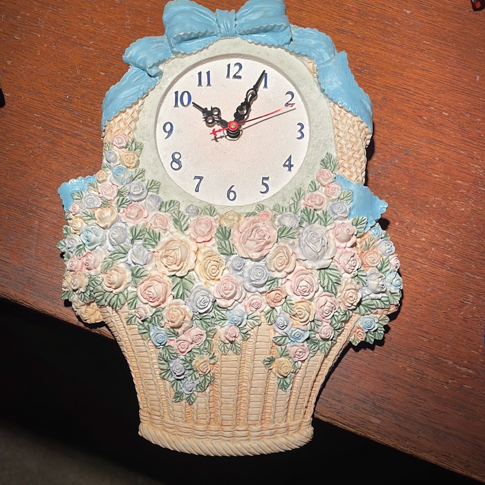 Decorative ceramic hand-painted wall clock with pink and blue flowers and ribbon